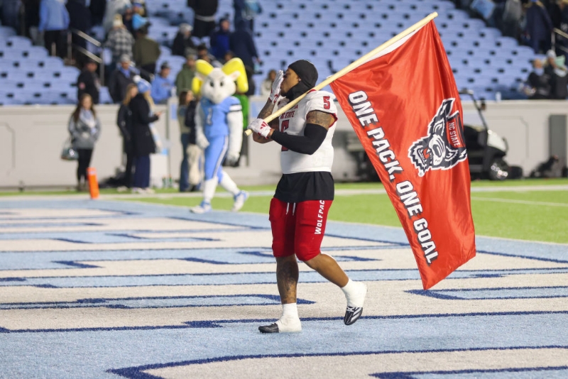 Rivalry Week Mayhem: NC State Flag-Planting Attempt After UNC Upset Ignites On-Field Brawl