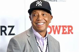 RUSSELL SIMMONS SUED BY FORMER DEF JAM EXEC FOR ALLEGED RAPE