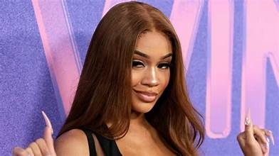 SAWEETIE RESPONDS TO FAN REQUESTS THAT SHE MOVE INTO MODELING