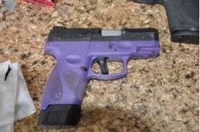 IMPD: Lawrence woman arrested after guns, drugs found during house search
