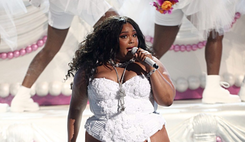 Lizzo Asks Fans To Stop Bringing Chris Evans Pictures To Tour
