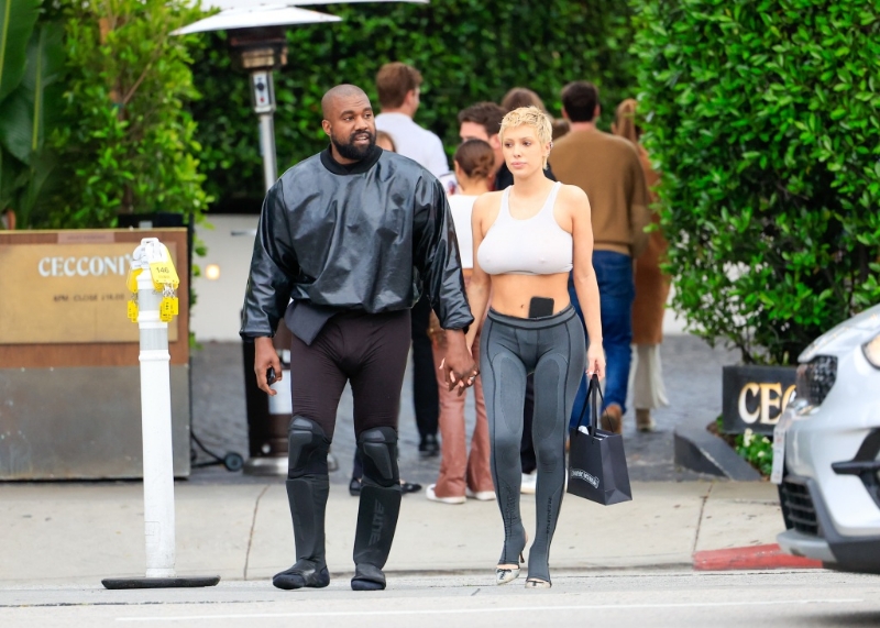 Kanye West's Shoulder Pads & Sock Shoes Make Another Appearance While Out With North & Saint West