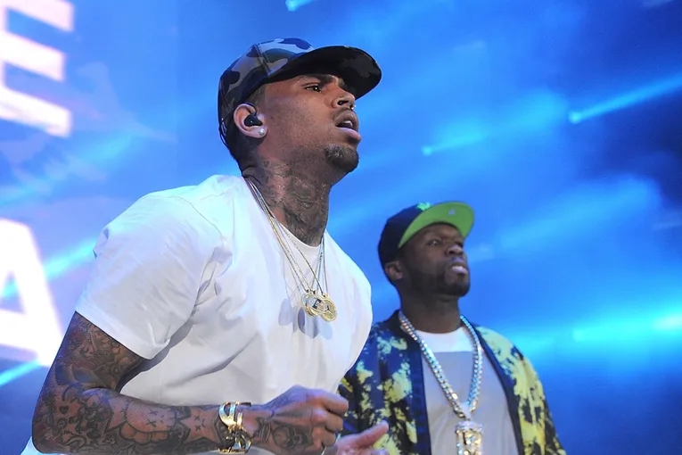 50 Cent Reacts To Chris Brown's U.K. Arrest