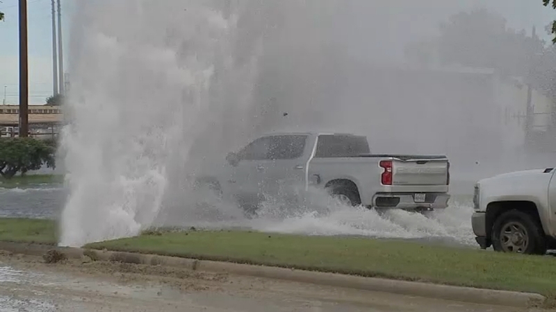 Main break repaired after video shows water shooting several feet into air, flooding the area