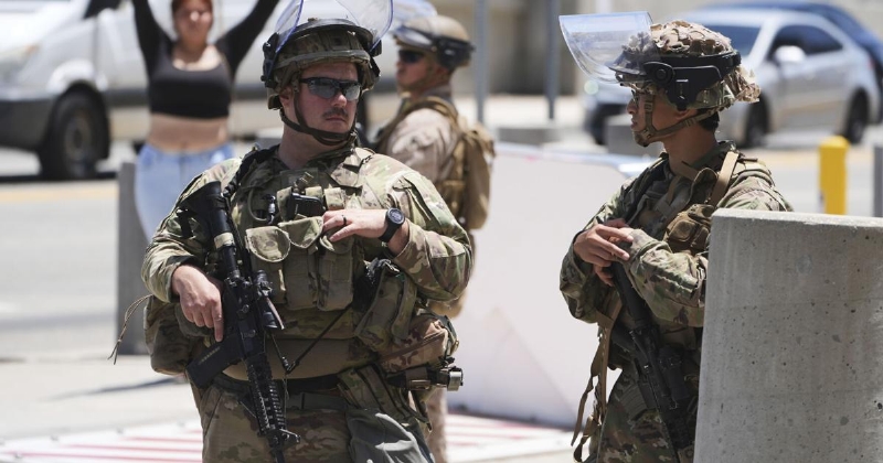 The Latest: Trump hints at more military deployments in US