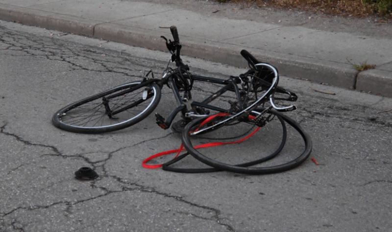 Docs: Man crashed work van into bicyclist, left scene