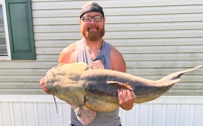 Monroe County man catches record-breaking 64-pound flathead catfish