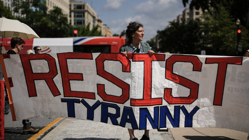 Protesters Gather Near White House as Trump Unveils D.C. Plans