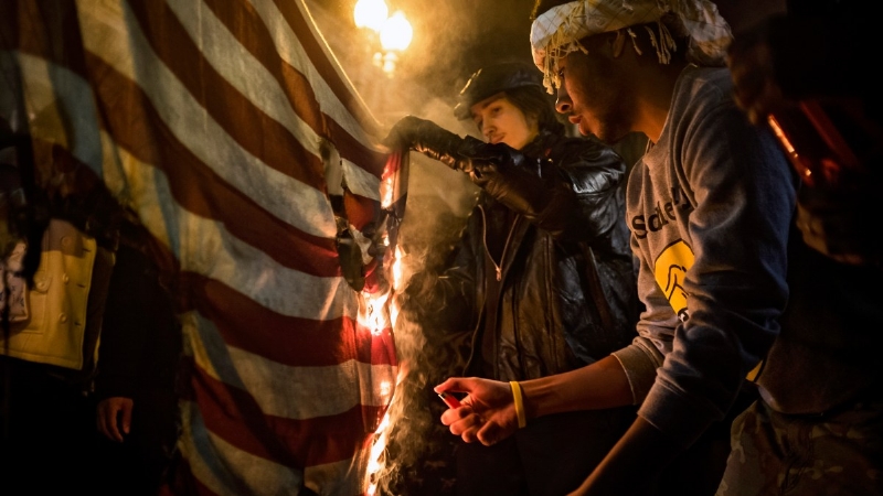 Trump faces backlash from own base after flag-burning ban