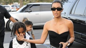 Not Havin' It! Saint West Flips Off Paparazzi While Out
& About With Kim Kardashian