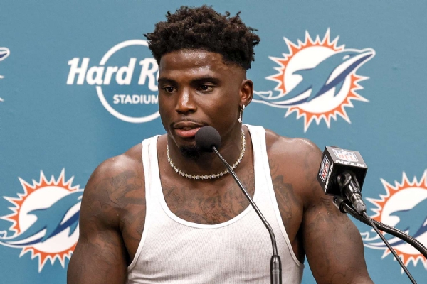 SPORTS NEWSBodycam Shows Police Dragging NFL Star Tyreek Hill From Car During Speeding Incident