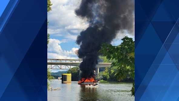 Large boat engulfed by flames along the Allegheny River; 1 injured