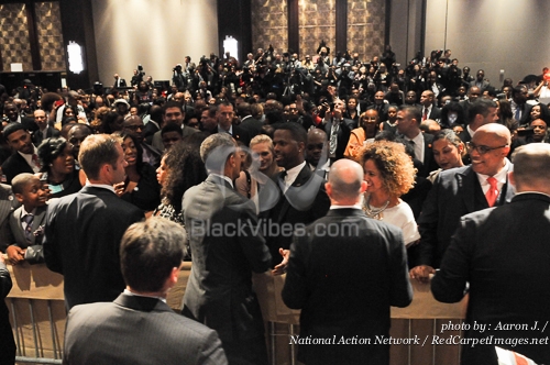President Barack Obama greets guests