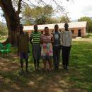 Rita with orphan children and in school; Karamoja Uganda Mission 2014