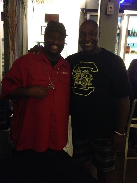 DJ Bishop w/ NFL Hall of Famer Sterling Sharpe