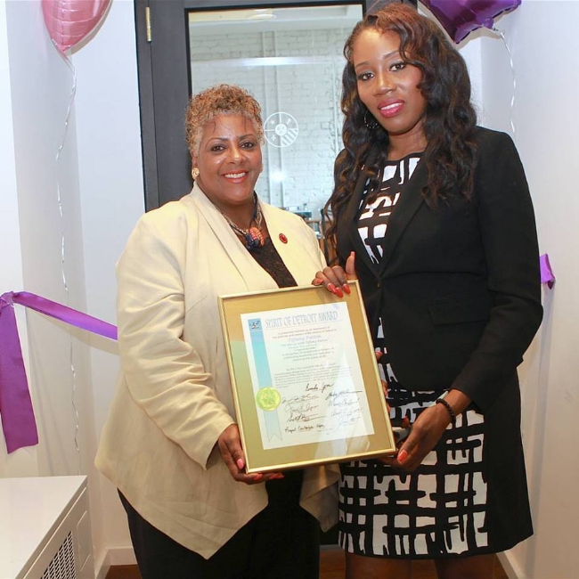 RECEIVING THE SPIRIT OF DETROIT AWARDS FROM COUNCILWOMAN BRENDA JONES OFFICE CITY OF DETROIT