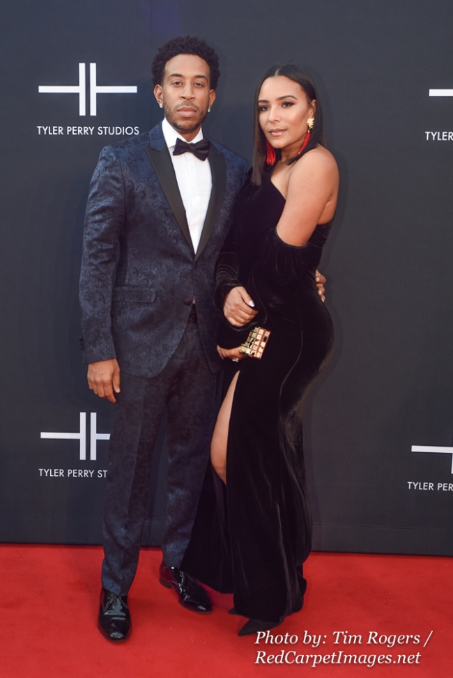 Actor / Rapper Chris 'Ludacris' Bridges and his Wife attend Tyler Perry's Atlanta Studio Grand Opening
