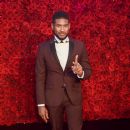Singer Usher Raymond attends Tyler Perry's Atlanta Studio Grand Opening