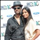 Singer Eric Benet and guest pose for picture at the 2010 BET Awards