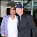 Kevin Liles (Music Exec) & Kid (House Party) at an Essence Encore party