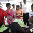 Rick Ross and Trina hand out backpacks @ 3rd Annual Rick Ross Be Out Day