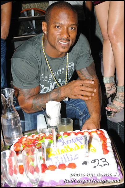 Willis McGahee poses with his cake at his Birthday party in Washington DC