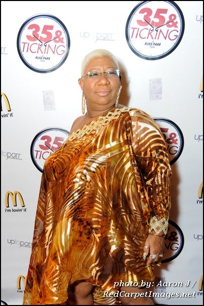 Actress Luenell poses on for cameras on the red carpet