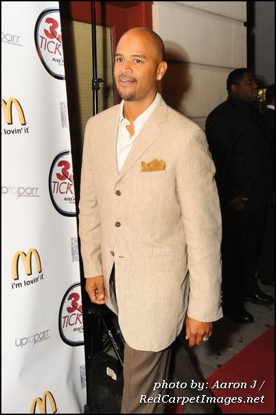 Actor Dondre Whitfield arrives to the red carpet at the movie screening