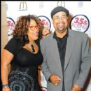 Executive Producers Kym Whitley and Russ Parr stop on the red carpet at the movie screening