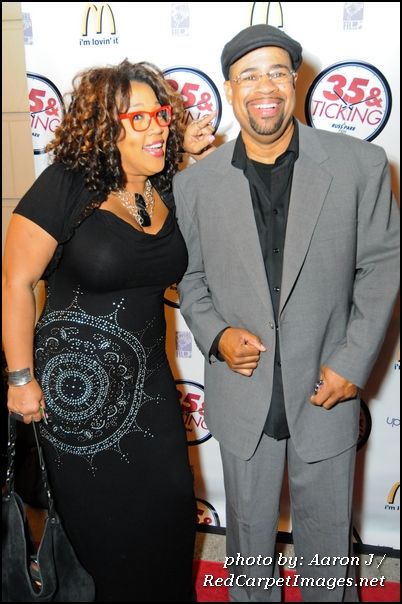 Executive Producers Kym Whitley and Russ Parr stop on the red carpet at the movie screening