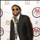 Actor Darius McCrary poses on the red carpet for the event