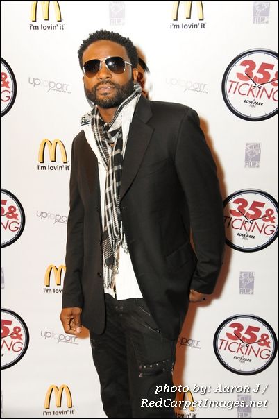 Actor Darius McCrary poses on the red carpet for the event