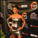 Singer Chili (TLC) poses on the red carpet