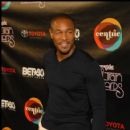 R&B Artist Tank stops for Photographers on the red carpet