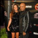 Peabo Bryson and guest on the red carpet at the 2010 Soul Train Awards