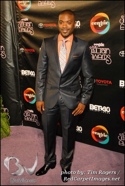 Singer Ray J stops and poses on the red carpet