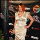 Faith Evans poses on the carpet at the 2010 Soul Train Awards