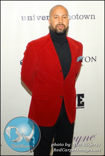 Kenny Burns attends Devyne Stephens' Annual Holiday Charity Event in Atlanta