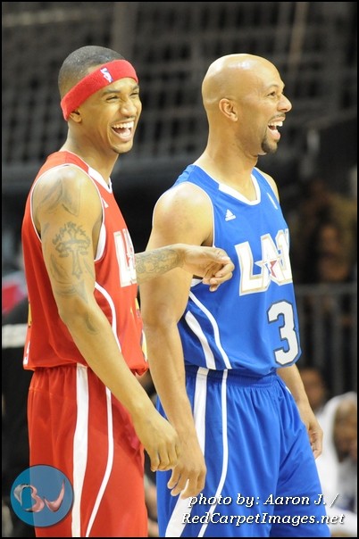 Trey Songz and Common share a laugh before game time