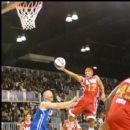 Trey Songz glides to the basketball for two of his points