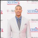 Chicago Bulls AllStar Derrick Rose stops for a picture on the magenta carpet