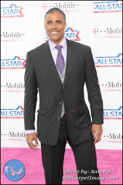NBA Great Rick Fox stops for a picture on the NBA AllStar Game magenta carpet