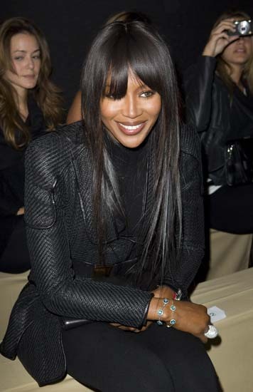 Naomi Campbell watches the Alexander McQueen show during Paris Fashion Week