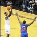 Wizards John Wall pulls up for a jumper over Pistons Will Bynum