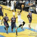 Wizards Maurice Evans drives for the dunk