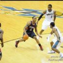 Hawks Guard Jeff Teague starts his drive on the Wizards defenders