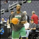 Celtics Jermaine O'Neal warms up before the game