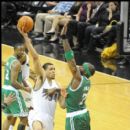 Wizards JaVale McGee shoots over Jermaine O'Neal