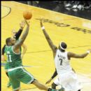 Celtics Glen Davis shoots over Andray Blatche in overtime