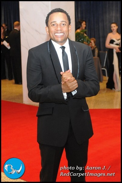 Actor Hill Harper is happy to talk to the media while attending the White House Correspondents Dinner